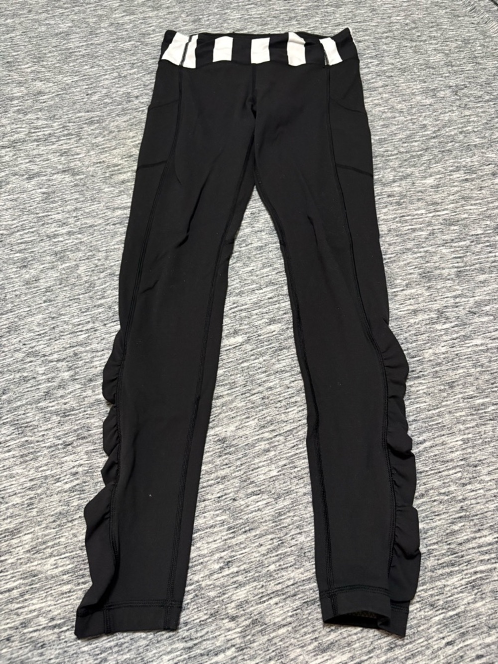 Lululemon Speed Tight Black with Ruffle Size 6